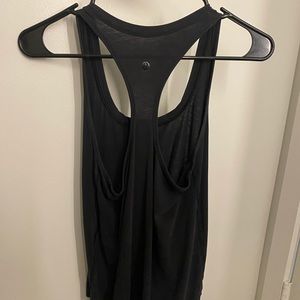 Lululemon black tank top w front pocket. worn couple times